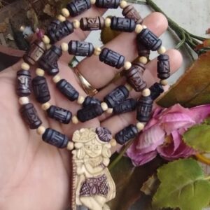 Embrace divinity with Radha Ballabh Ji and Radha Carved Tulsi Mala. Exquisitely crafted, perfect for devotion, meditation, and spiritual connection.