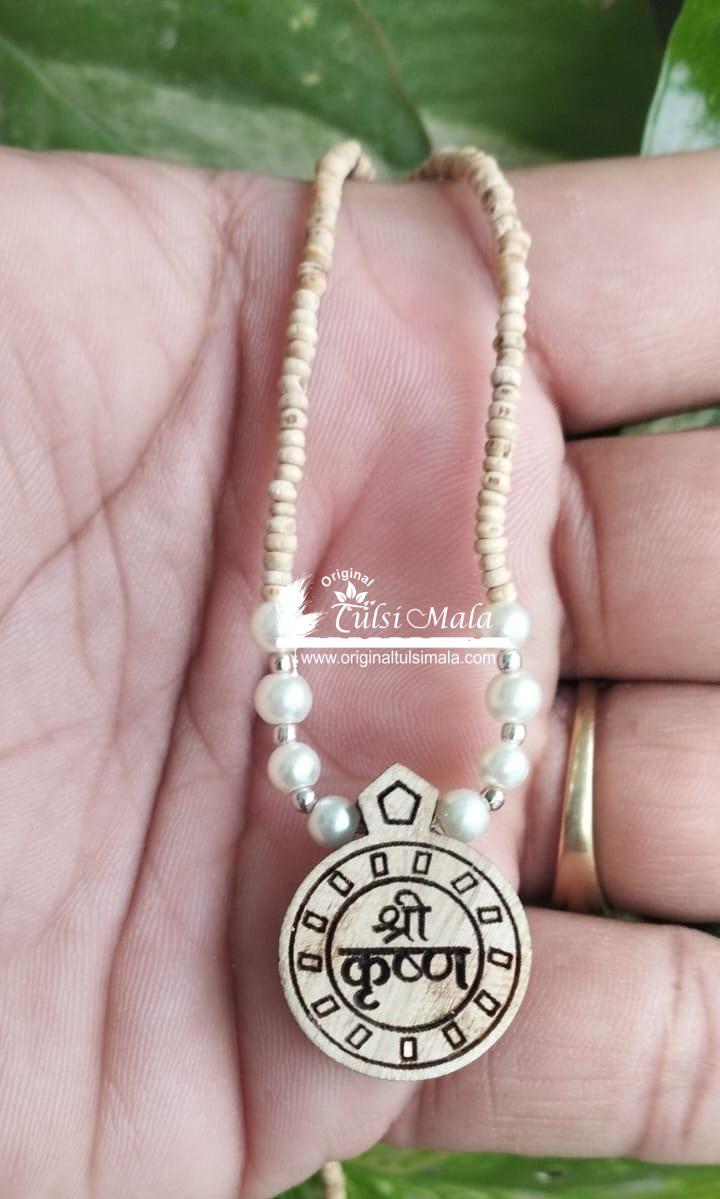 Radha Carved Tulsi Kanthi Mala with Real Pearls – Pure & Sacred